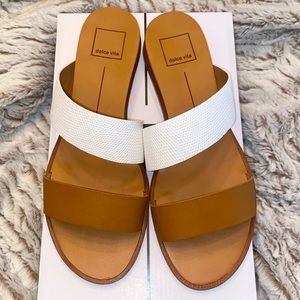 These beautifully simple slides are sure to go with any outfit!